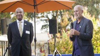 UC Davis Chancellor Gary May is introduced by Rob Davis, the mayor of the City of Davis during the Chamber Mixer held at the El Macero Country Club in Davis on August 16, 2017.