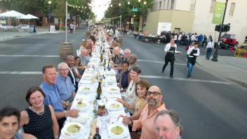 UC Davis table at Woodland’s Dinner on Main in the City of Woodland on Sunday, September 17, 2017.