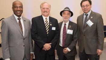Left to right: UC Davis Chancellor Gary May, Director of the California Environmental Law and Policy Center Richard Frank, Director of the Instiute of Transportation Studies Dan Sperling, and UC Davis Law School Dean Kevin Johnson chat during the symposium honoring the California Air Resources Board 50th Anniversary Symposium at the UC Davis Conference Center on Friday, January 19, 2017.