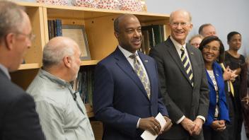 Interim Chancellor Ralph Hexter, professor Dave Rizzo, new Chancellor Gary May and acting provost Ken Burtis stand in front of Rizzo’s class as it is announced that Rizzo won the UC Davis Teaching Prize on April 14, 2017.