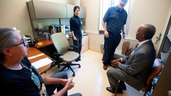 Chancellor Gary S. May tours the Student Health and Wellness Center on June 21, 2018. The Chancellor met with staff doctors for a meeting about improvements.