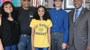 Chancellor May invited Tanishq Abraham, a 14-year-old UC Davis biomedical engineering graduate, and his family to his office.
