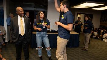 UC Davis Chancellor Gary May chats with ASUCD Vice President Shaniah Branson and ASUCD President Michael Gofman before the start of the Fall Welcome Event at the Pavilion on September 24, 2018.