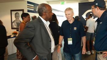 Chancellor Gary May and Bruce Edwards talk at the Bruce Edward Club Room during the football game between UC Davis and Idaho on September 22, 2018.