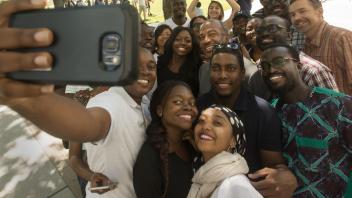 The Chancellor posing with students
