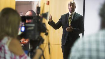 UC Davis Chancellor Gary May answers questions during a media availability event 