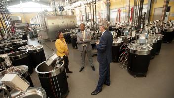 Chancellor Gary May and Dean Helene Dillard tour the Robert Mondavi Institute of Food and Wine with professor David Block.