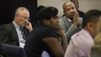 Chancellor Gary May and Provost Ralph Hexter meet with the Graduate Studies Office on the second floor of Mrak Hall