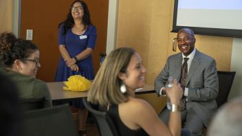 Chancellor Gary May visits with the Latinx Staff and Faculty Association at the Student Health and Wellness Center.