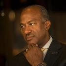 Chancellor Gary S. May, serious, looking left